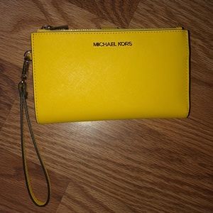 Authentic Michael Kors yellow wallet with wristlet